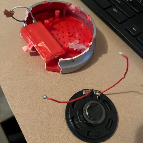 Extracted speaker from button